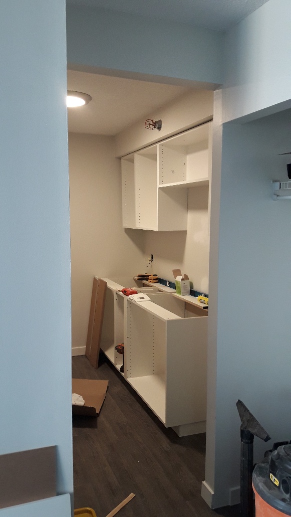 Image of cabinets being installed